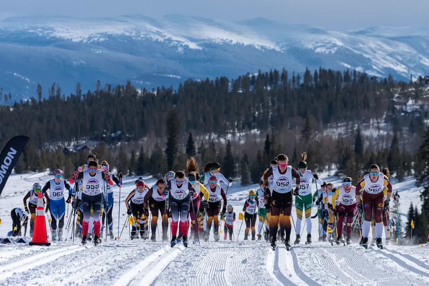 Photo of college ski racers during USCSA race at Snow Mountain Ranch in January 2024.