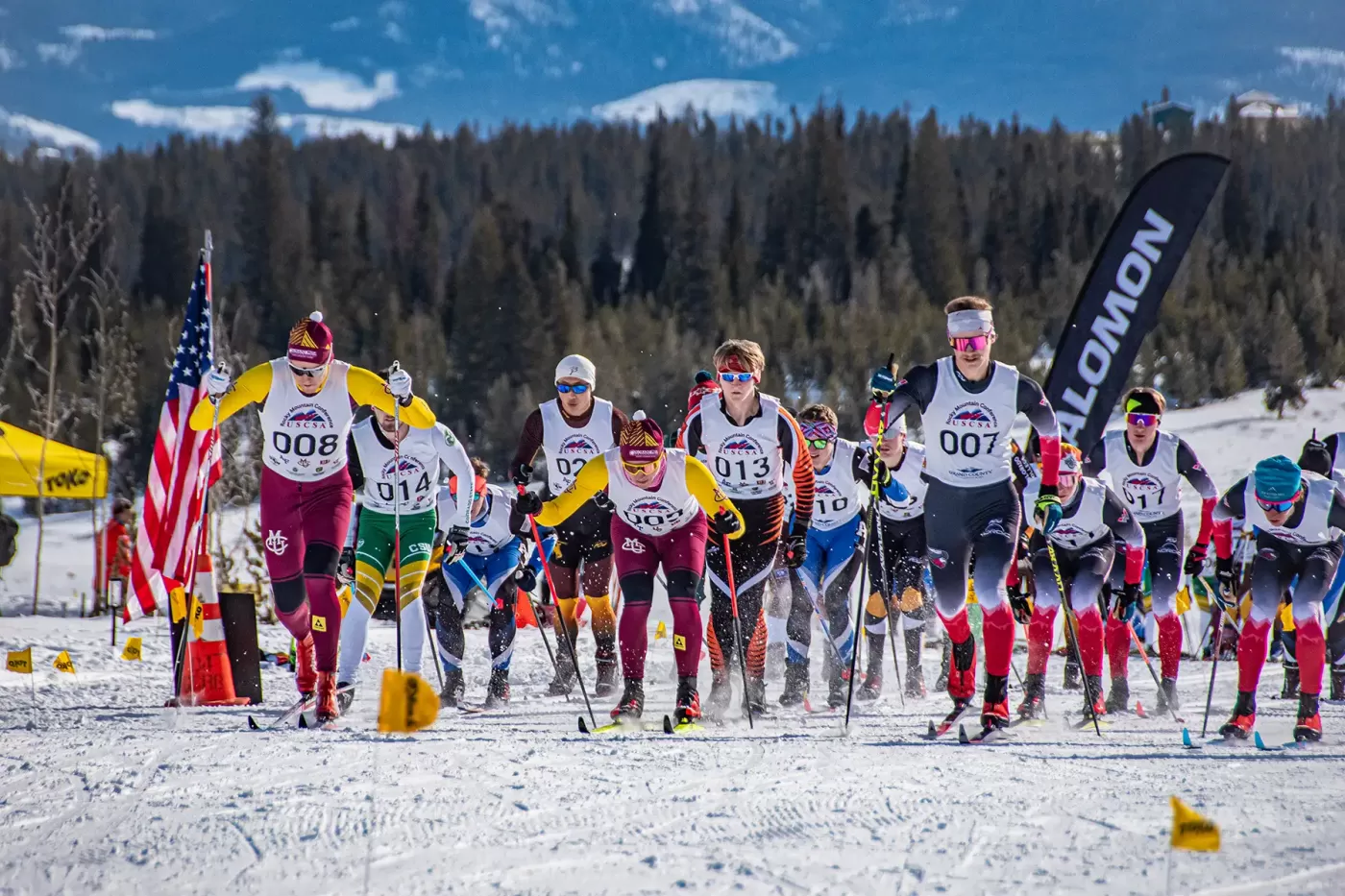 Photo of college ski racers during USCSA race at Snow Mountain Ranch in January 2024.
