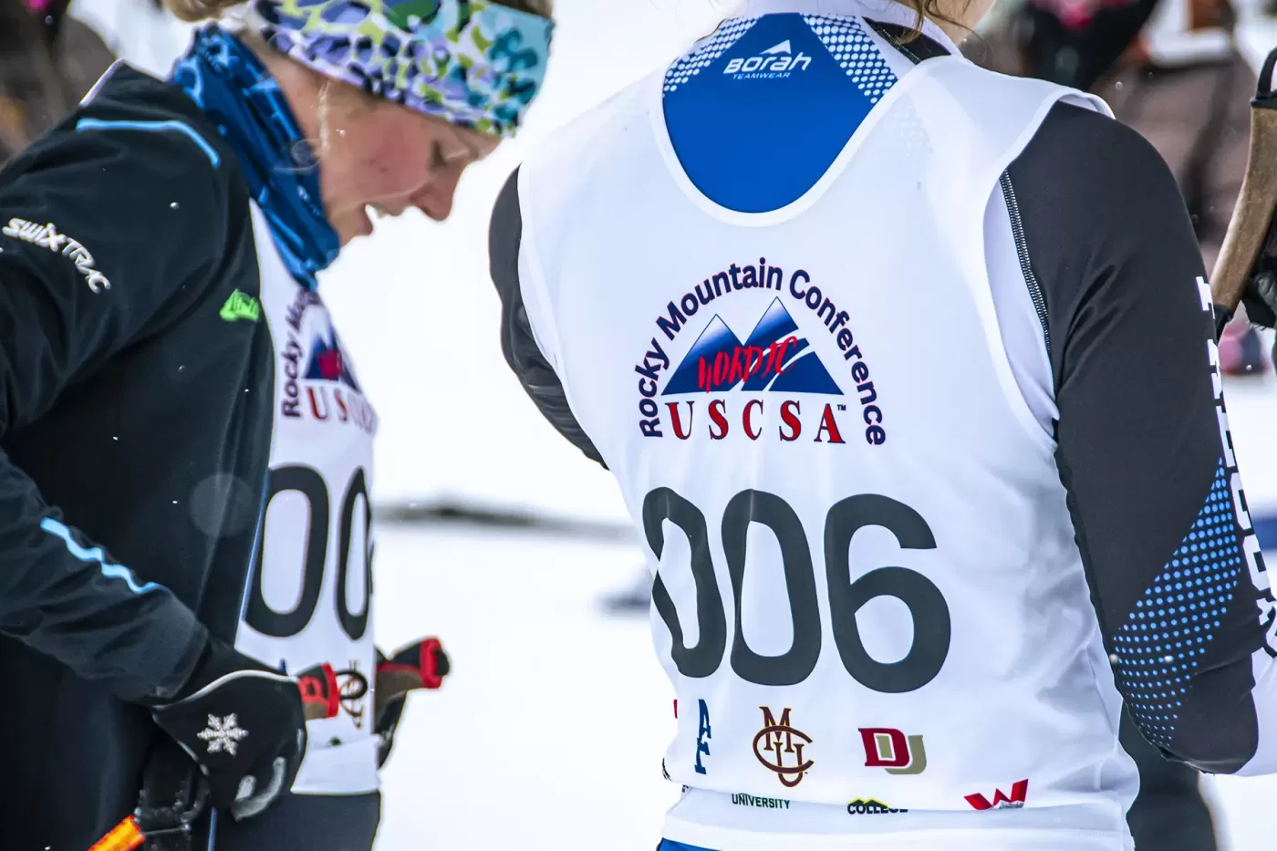 Photo of college ski racers during USCSA race at Snow Mountain Ranch in January 2024.