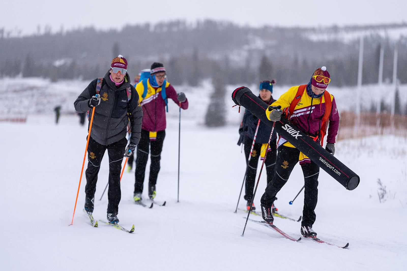 The CMU Cross Country Ski Team heading out to the race course.