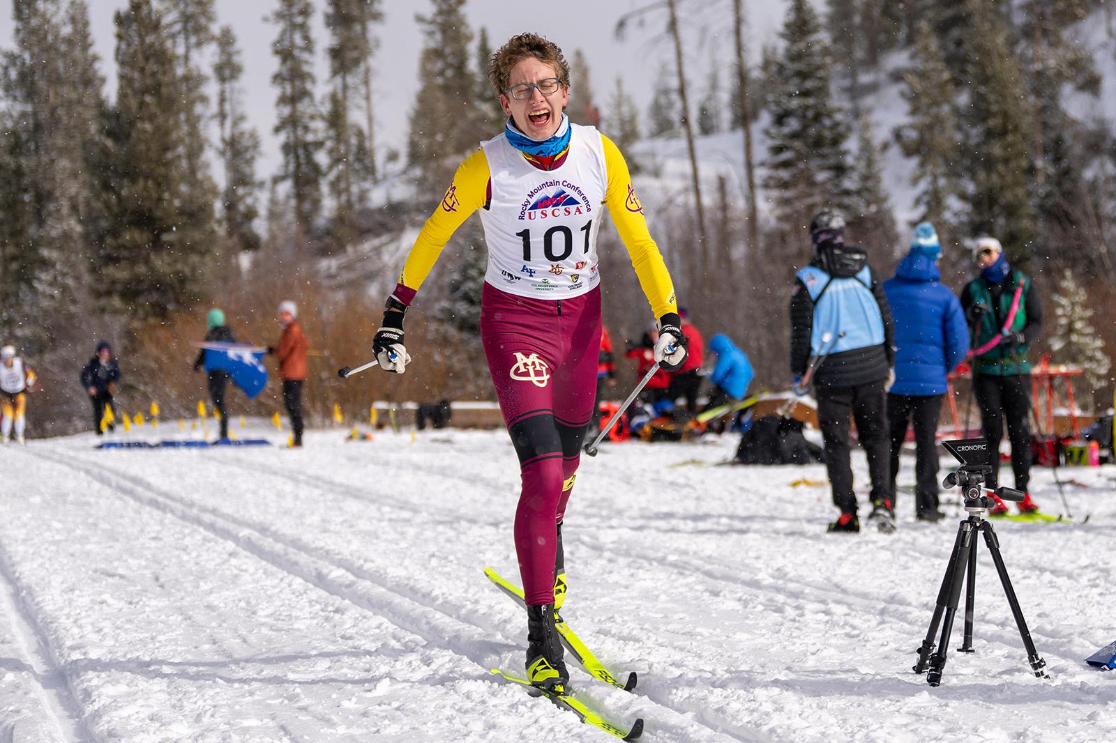 Wesley Sumner (CMU) powers across the finish line to claim first place.