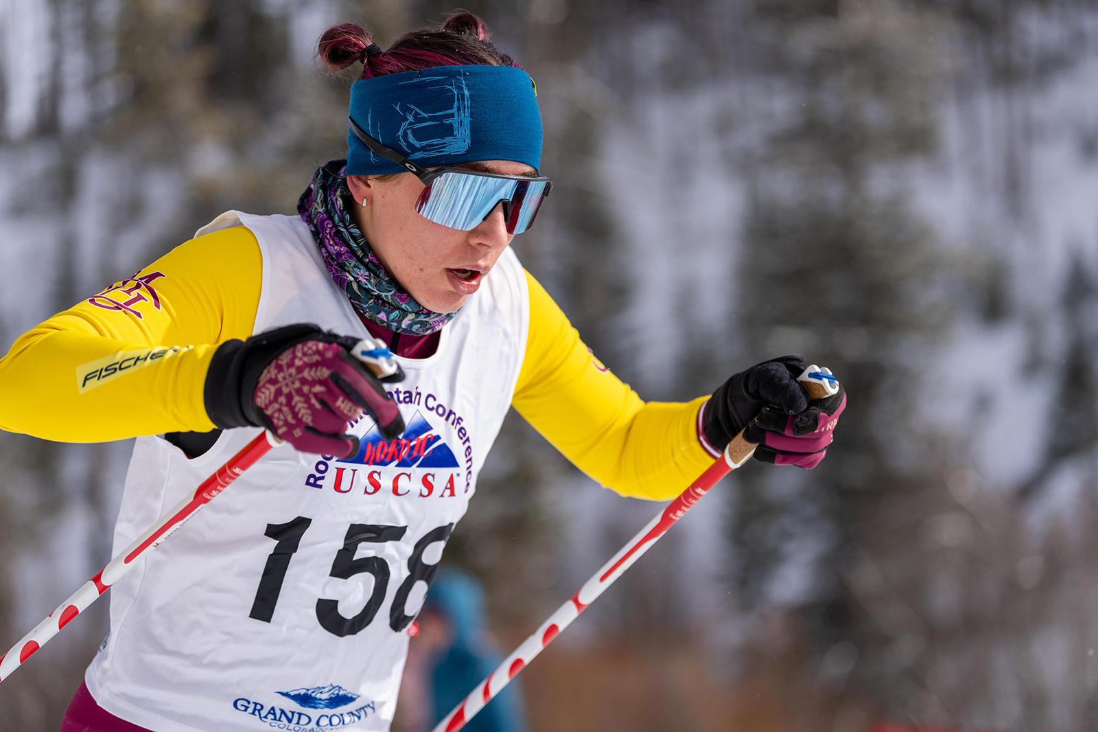 Greta Bochenek (CMU) breaks the race open early, skiing solo to a dominant first-place finish.